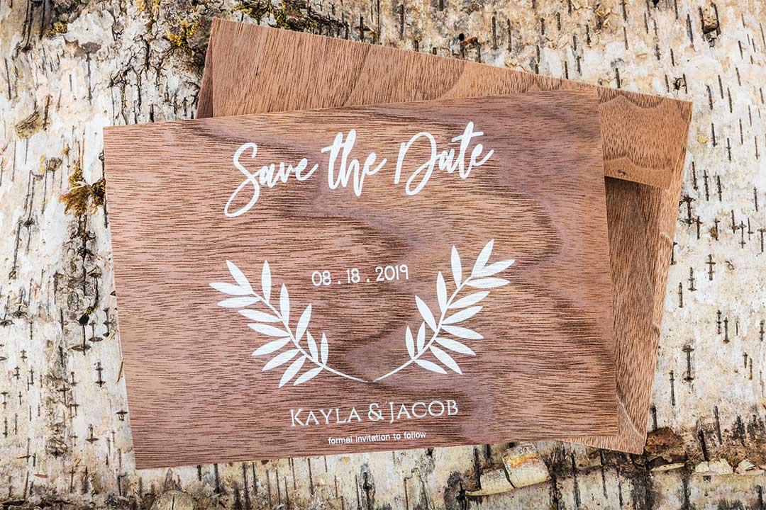 Save the date white printed ink on walnut wood paper